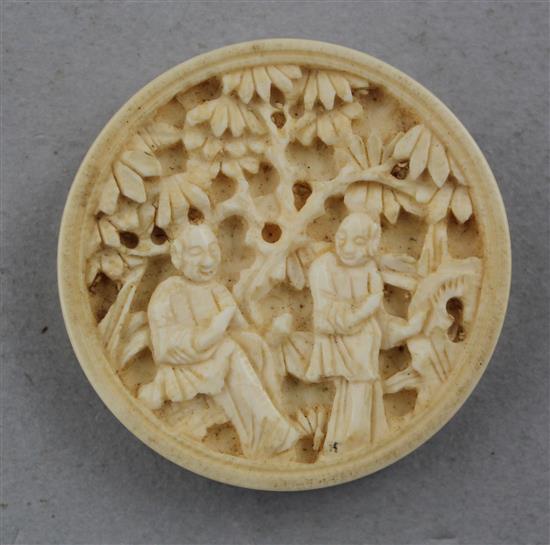 Thirty one Chinese export ivory chess / draught counters, late 19th century, each 3.5cm diam.